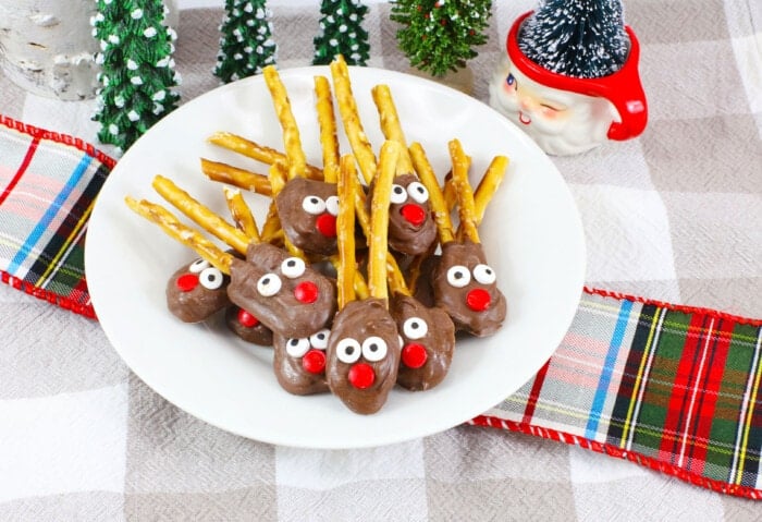 Reindeer Pretzels on a grey and white cloth.