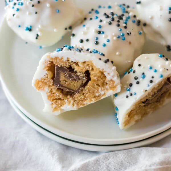 Rice Krispie Snowballs on two plates.