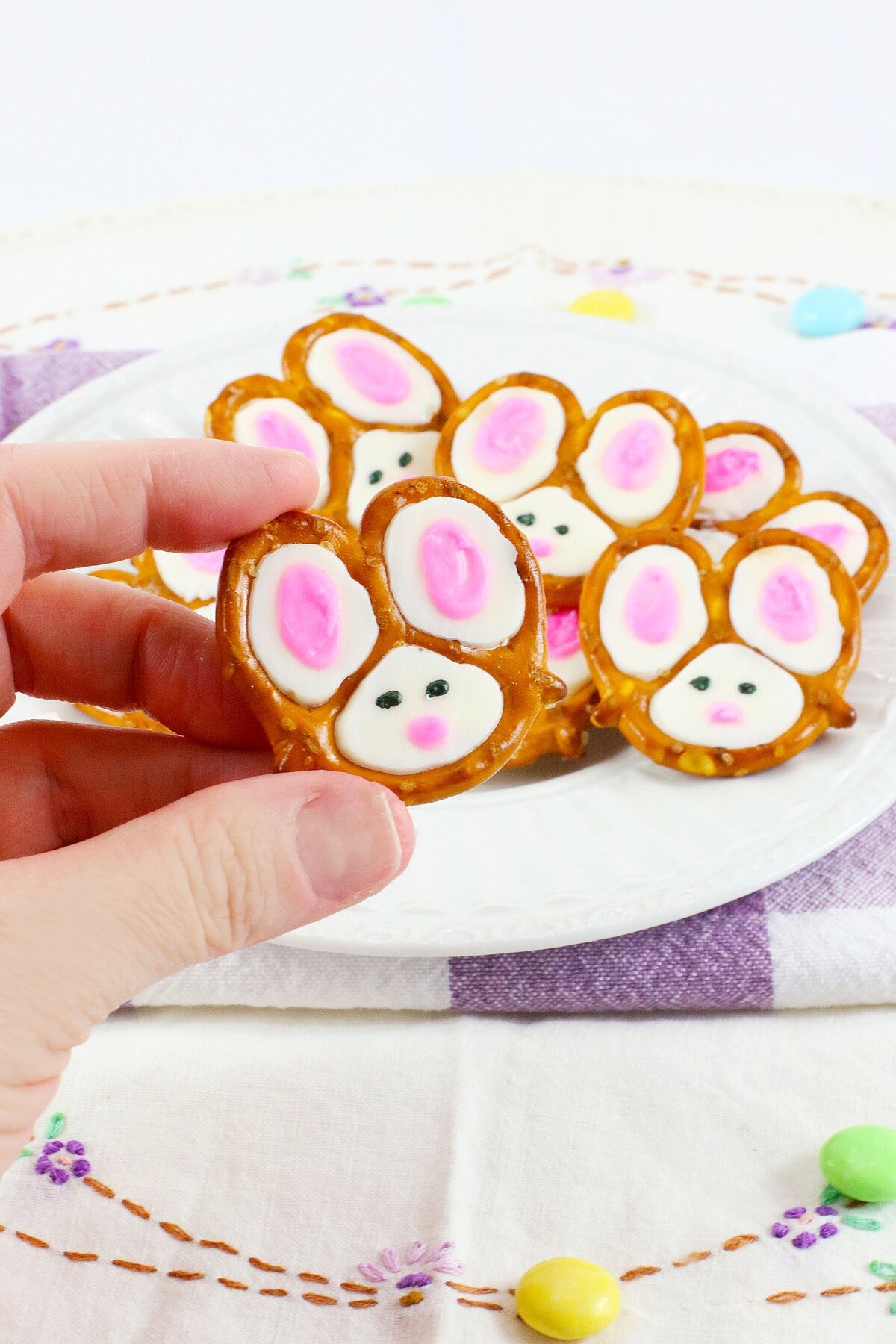 A hand holding the Bunny Pretzels.