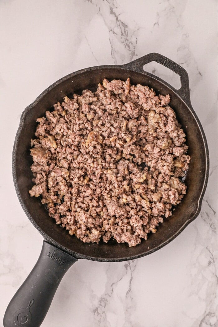 sausage cooked in cast iron skillet