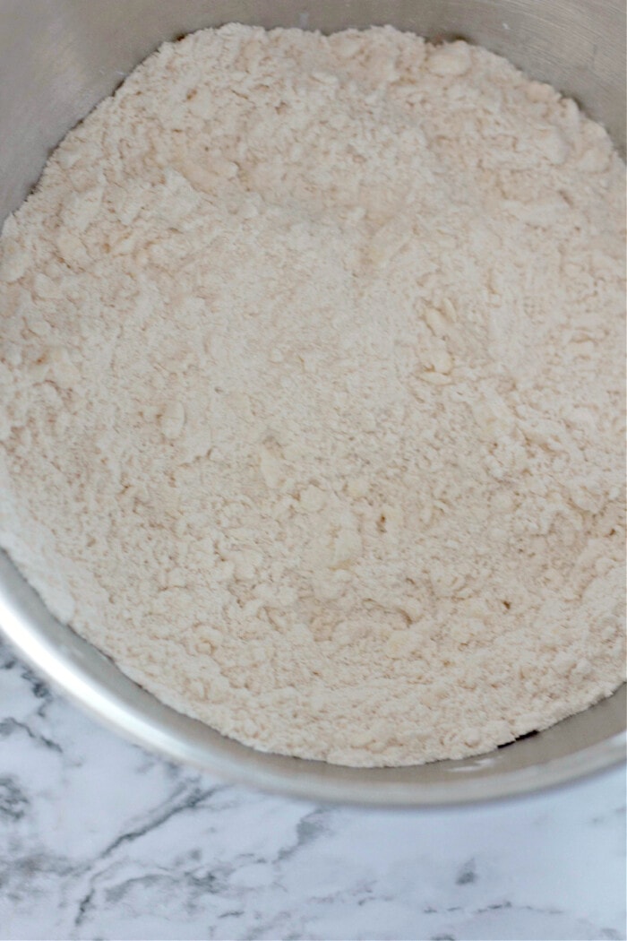 flour mixture and butter in crumbs for homemade flour tortillas