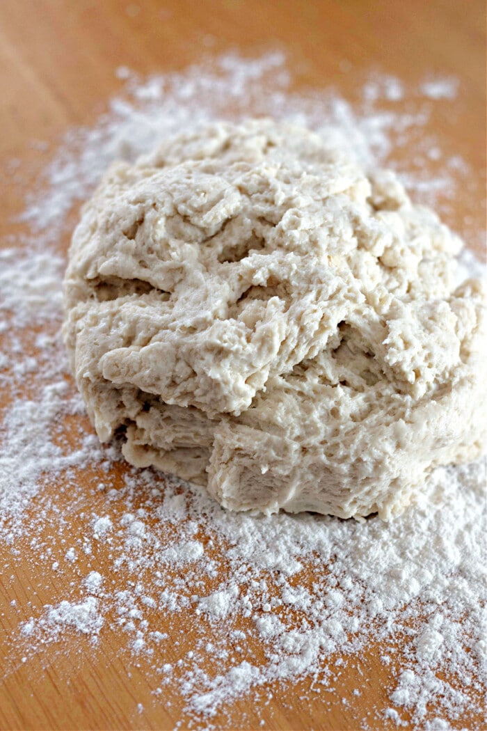 dough on board with flour