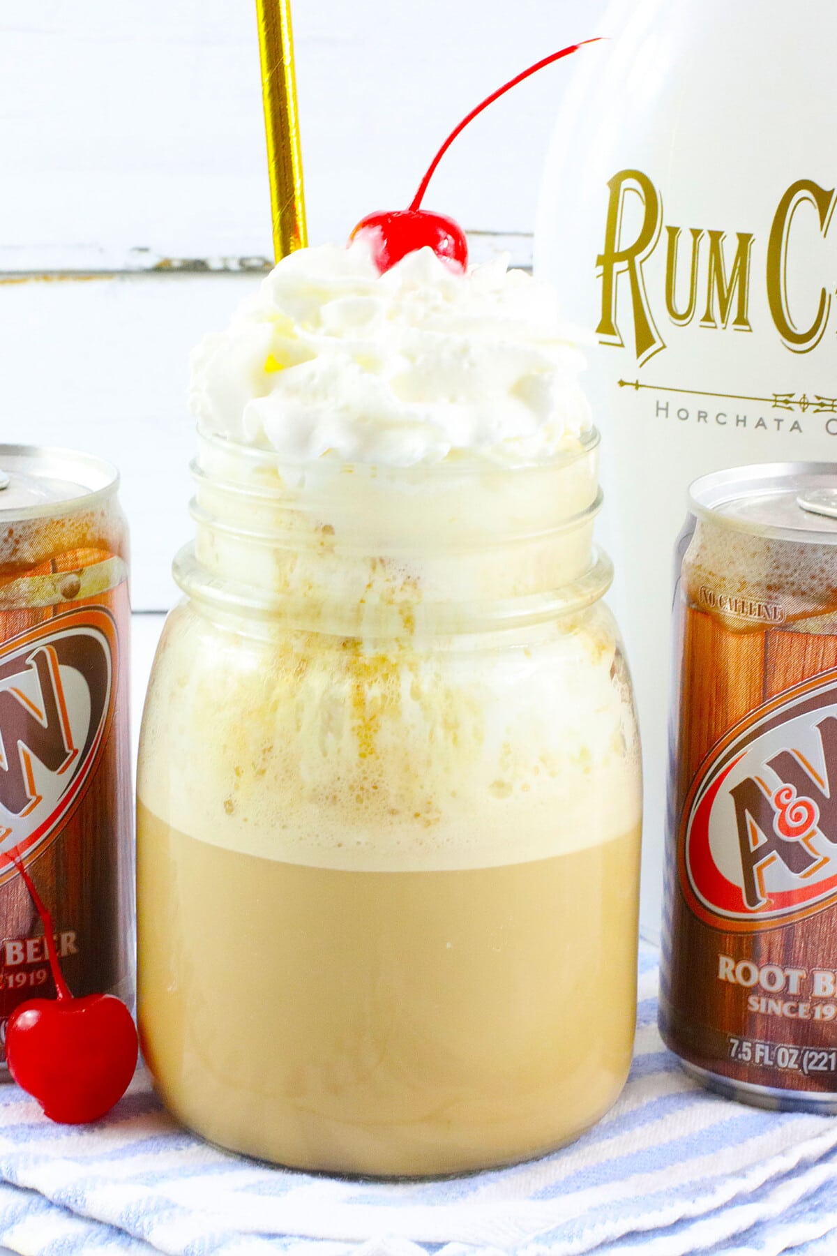 Rum Chata Root Beer Float with whipped cream on top.
