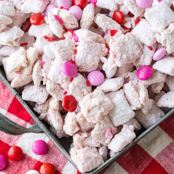 Strawberry Puppy Chow on a red checkered cloth.