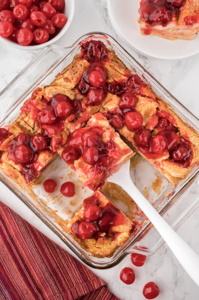 Cherry Bread Pudding cut into squares.