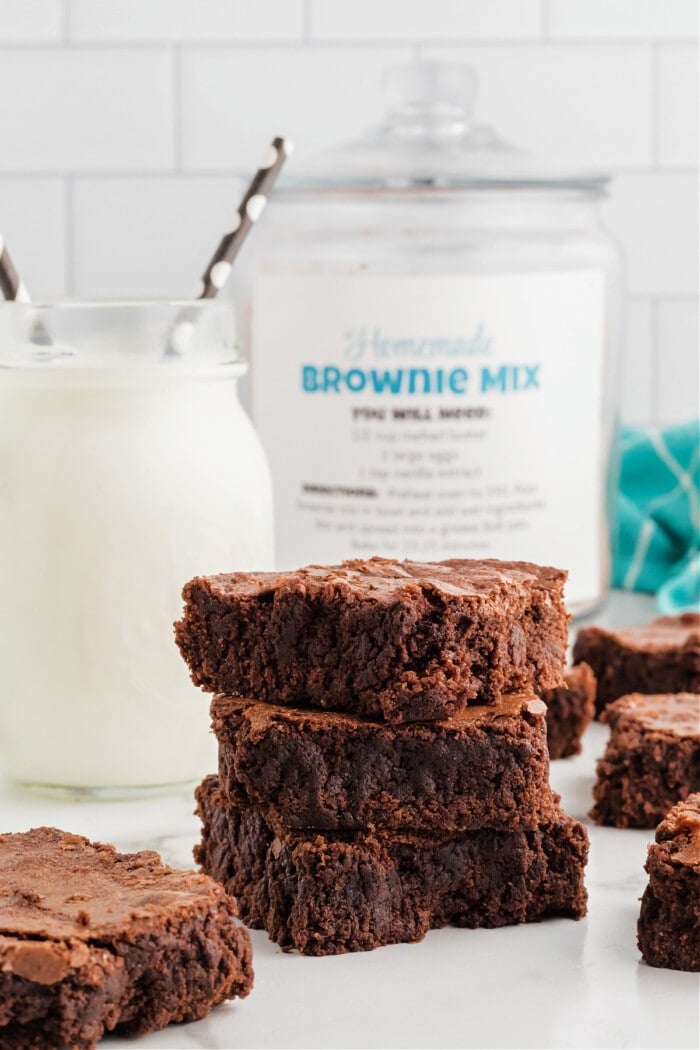 brownies made from homemade brownie mix stacked with milk