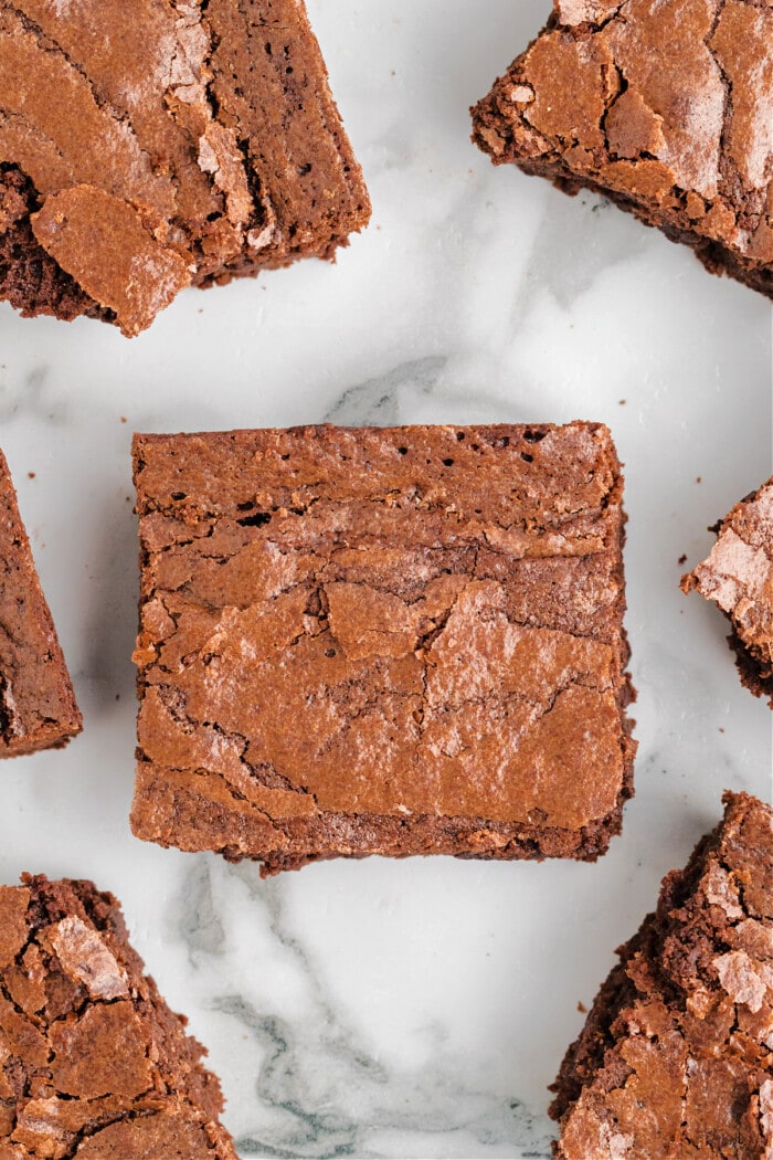 cut brownies on marble background