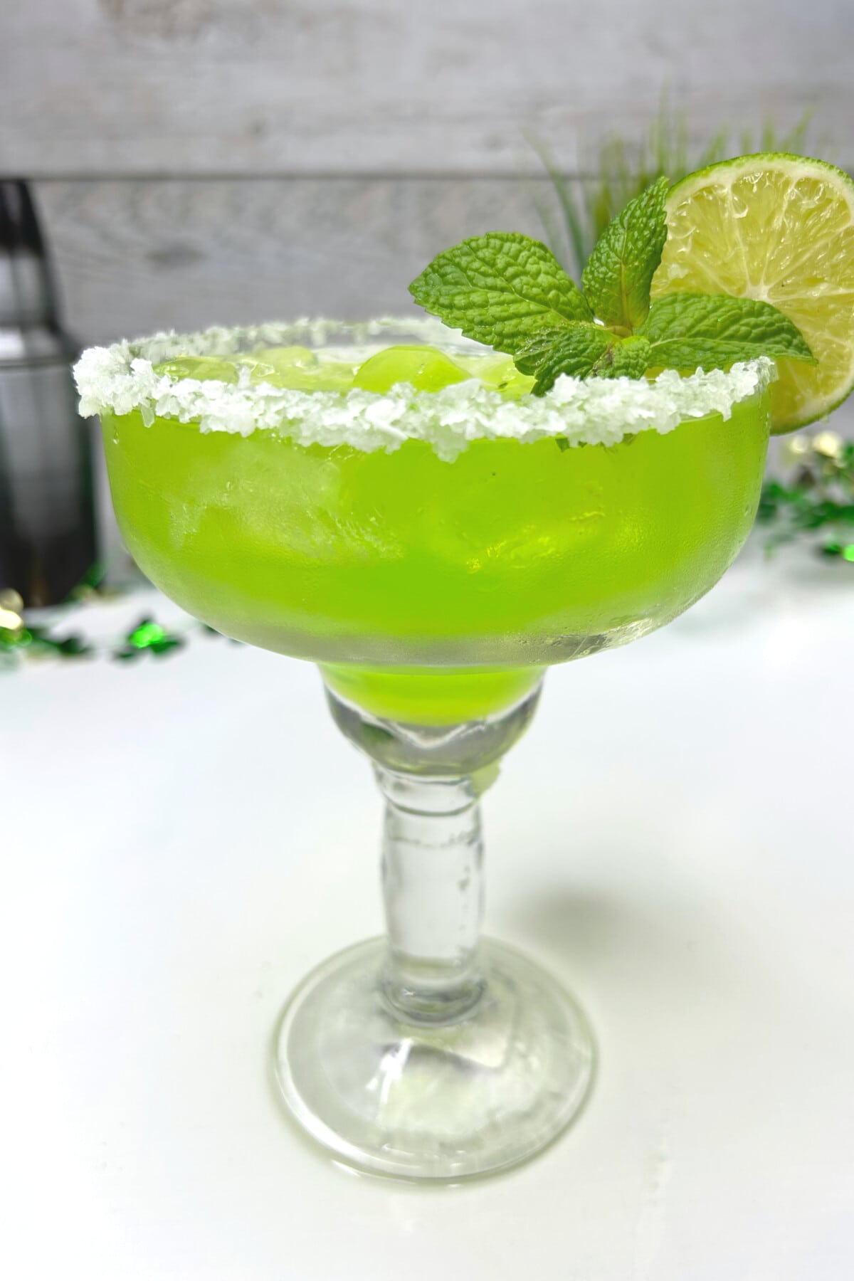 Irish Margarita garnished with lime and mint.