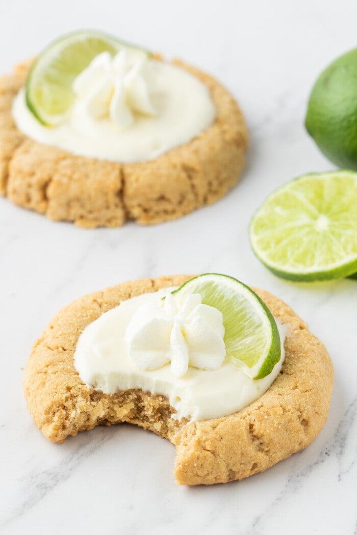 Key Lime Pie Cookies with fresh lime on top.