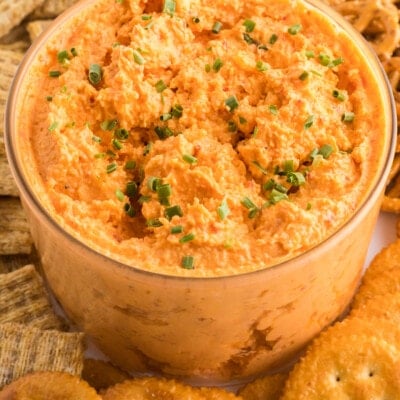 Pimento Cheese in a glass bowl with crackers