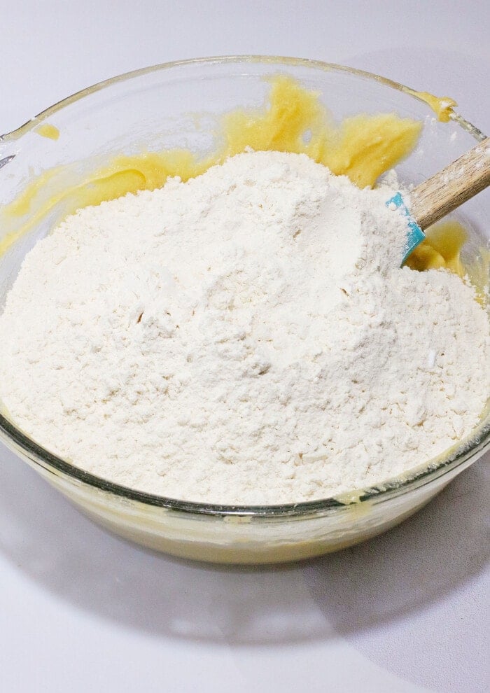 Adding the flour.