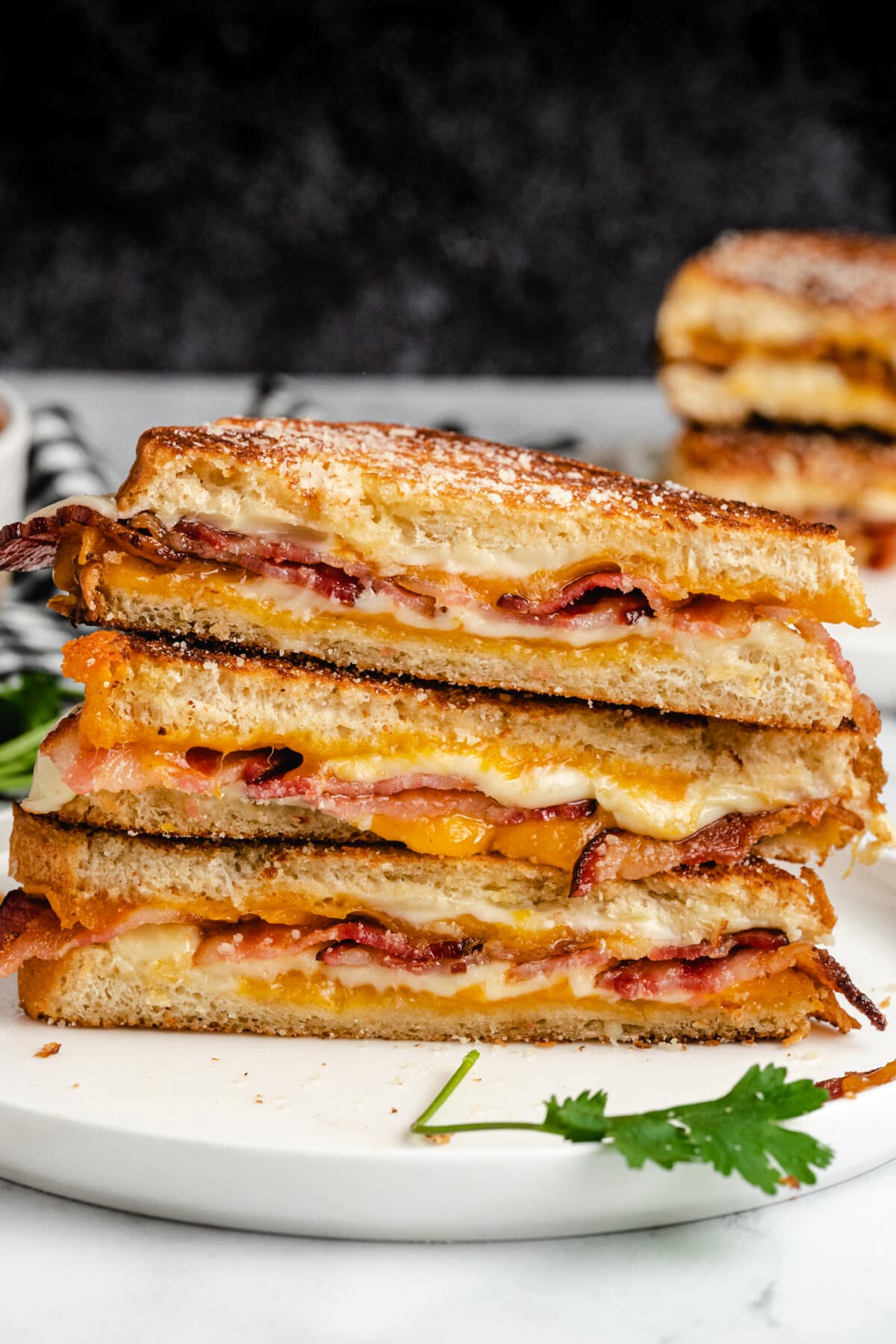 A stack of Bacon Grilled Cheese.
