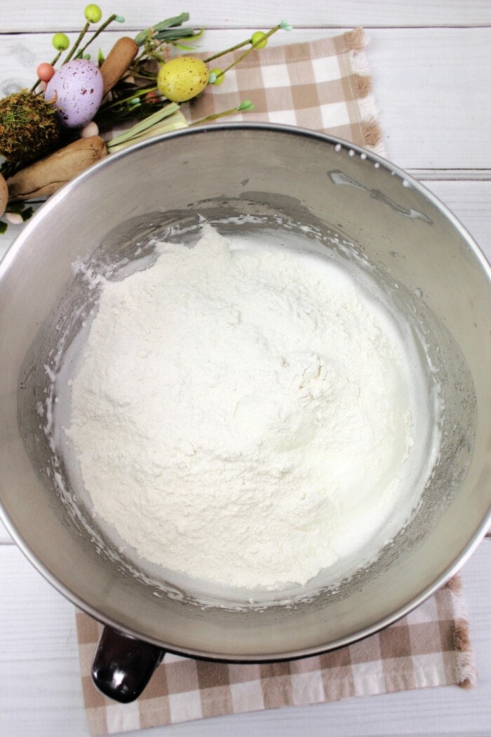 Adding the flour.