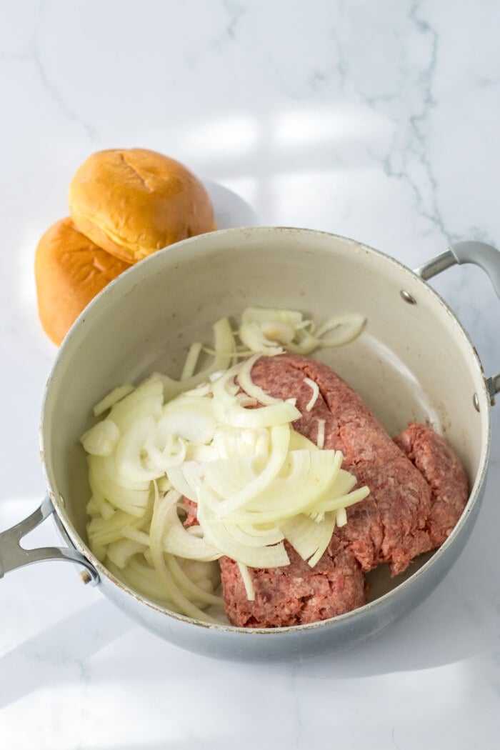 Cooking the beef and onions.