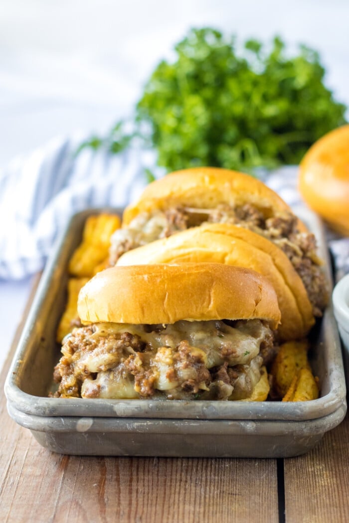 French Onion Sloppy Joes in a grey tray.