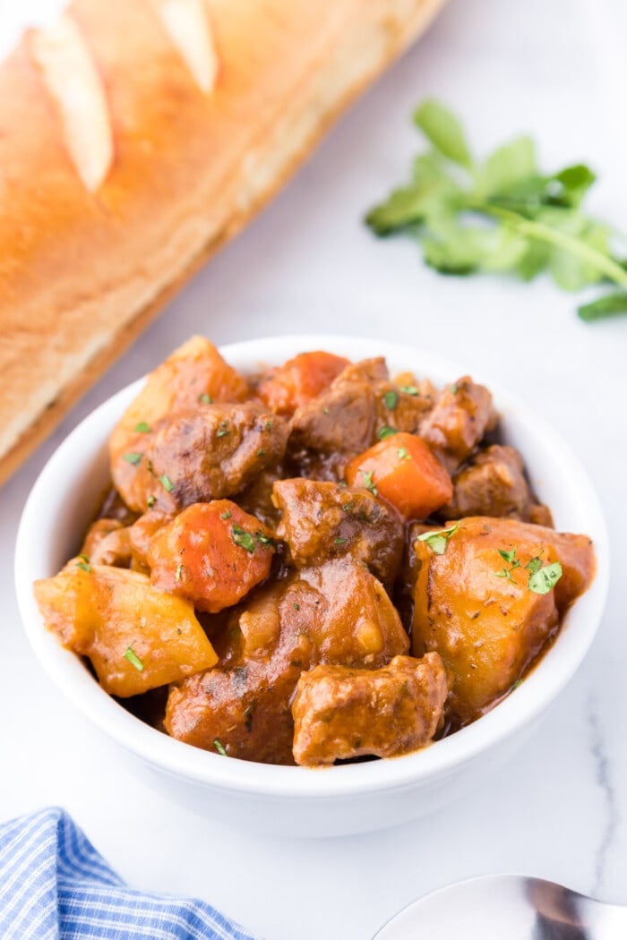 Irish Guinness Beef Stew with bread on the side.