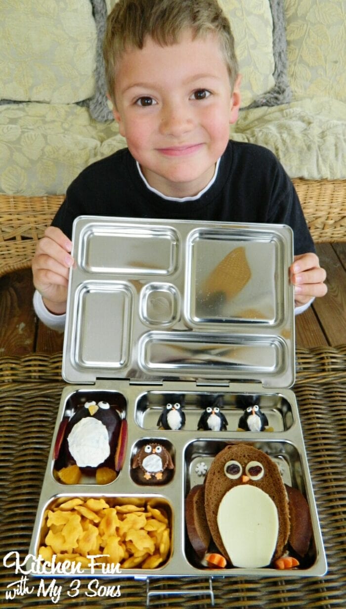 Boy with Penguin Bento lunch in a Planetbox