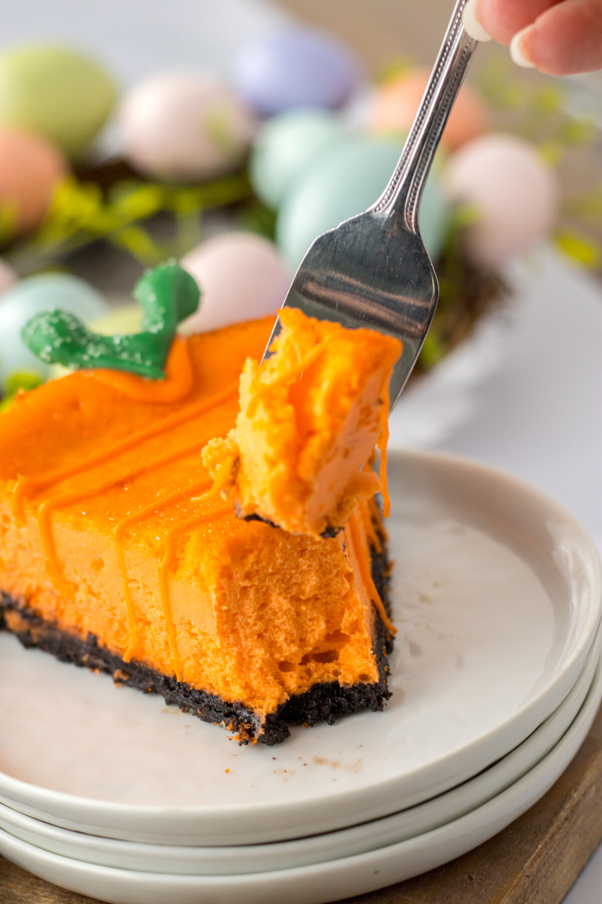 Carrot Cheesecake with a bite on a fork