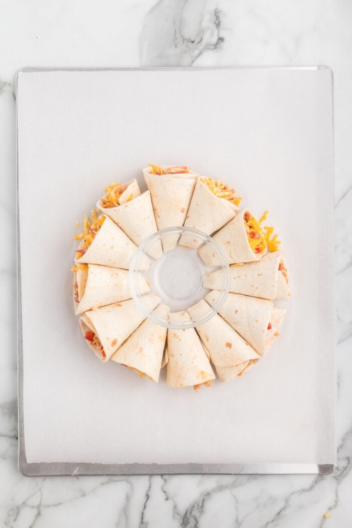 Overhead view of the first layer of a quesadilla ring