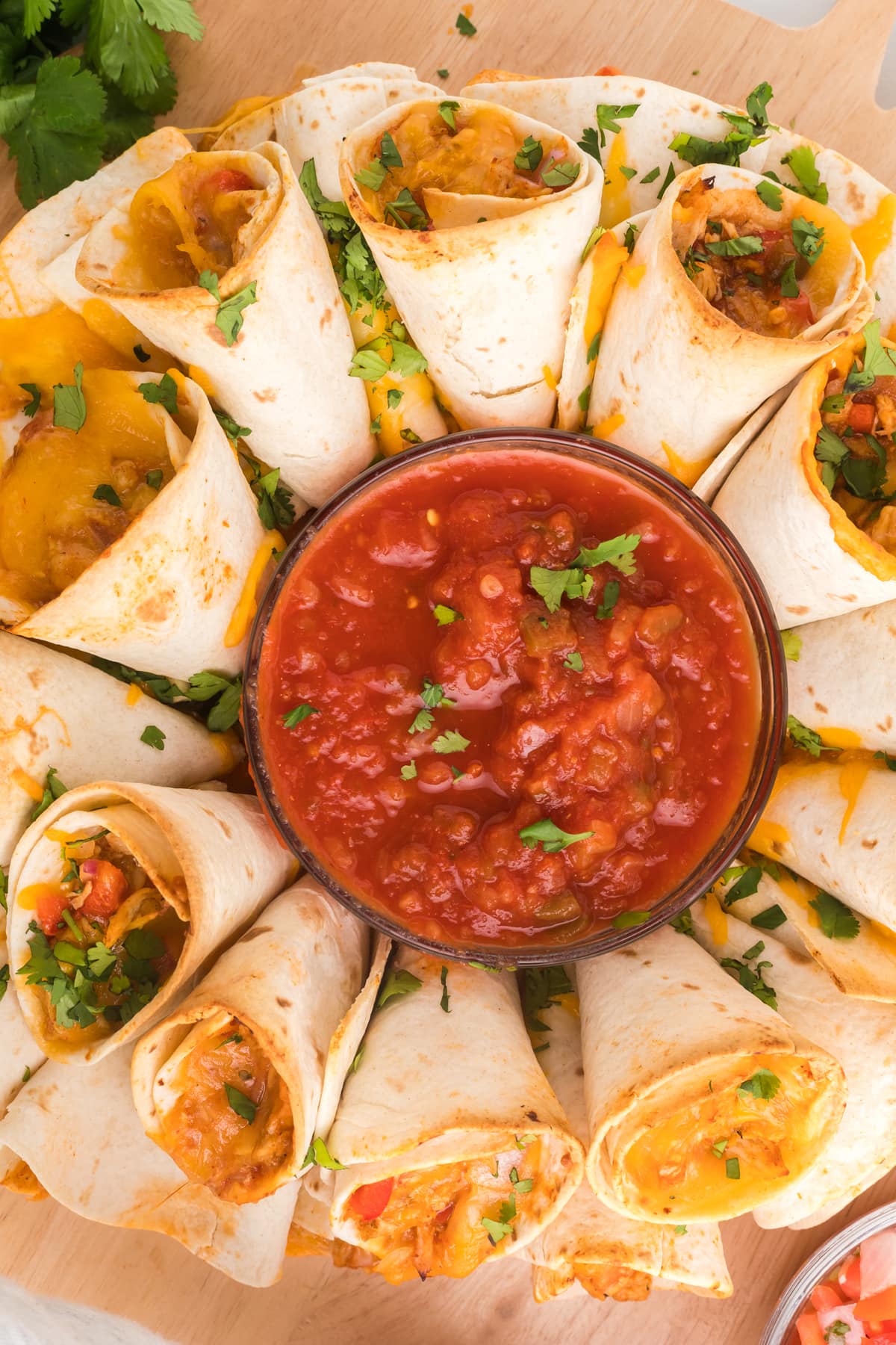 Close up of a blooming quesadilla with salsa in the center