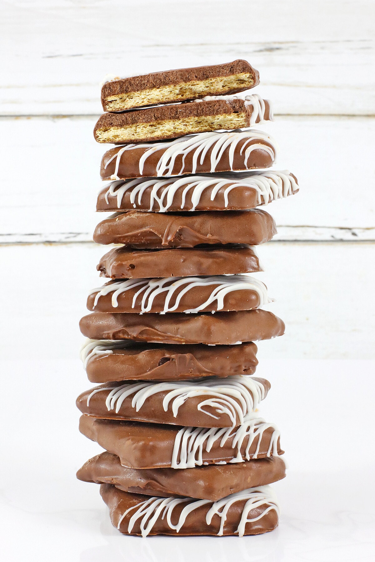 A large stack of Chocolate-Covered Graham Crackers.