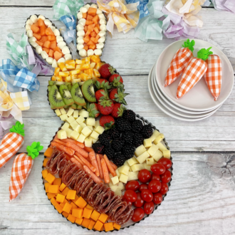 Easter Fruit Tray on a wooden board.