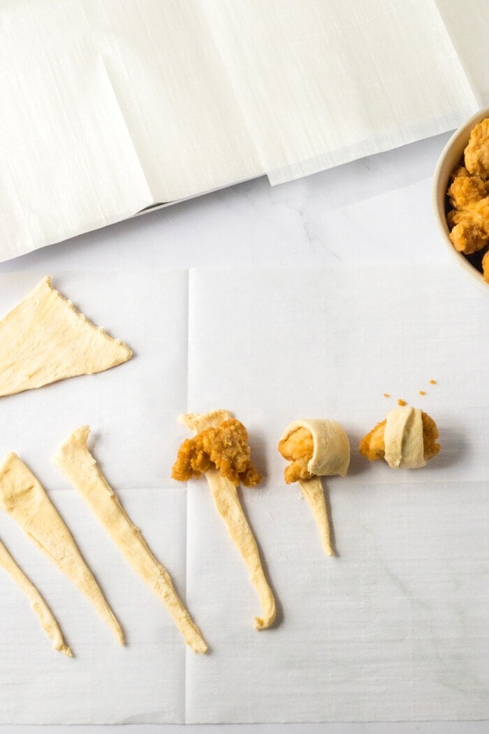 Wrapping the Glazed Chicken Crescent Bites.