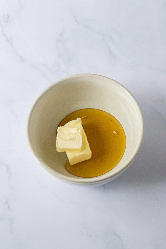 Melting the butter and honey.
