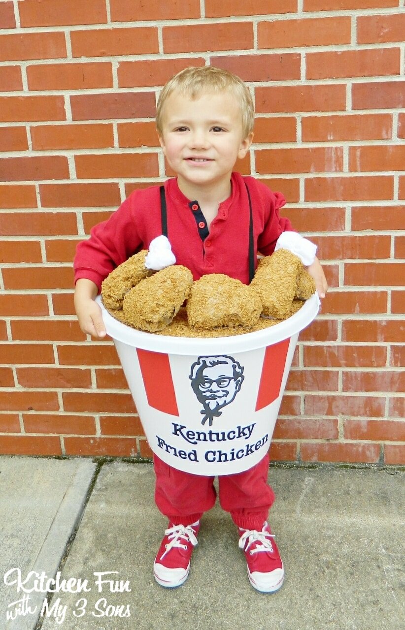 Boy in a KFC Chicken Bucket Costume
