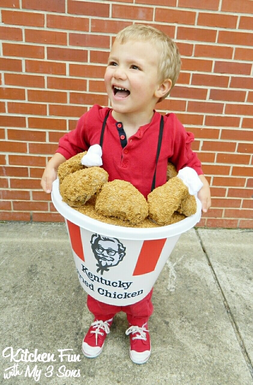 Boy in a KFC Chicken Bucket Costume