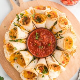 Overhead view of a blooming quesadilla with salsa in the center