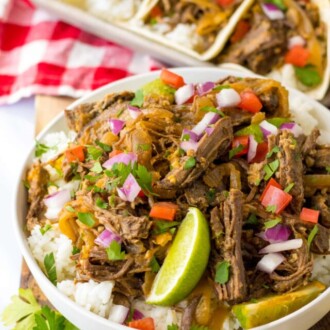 Slow Cooker Barbacoa in a white bowl.