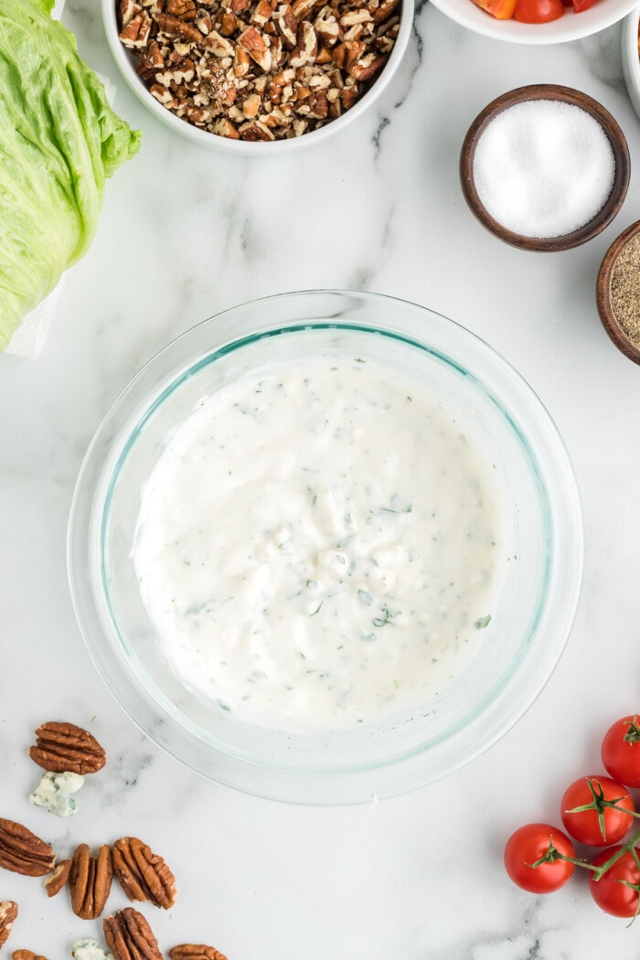 Homemade blue cheese dressing in a glass bowl
