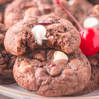 bite out of black forest cookie with cherries