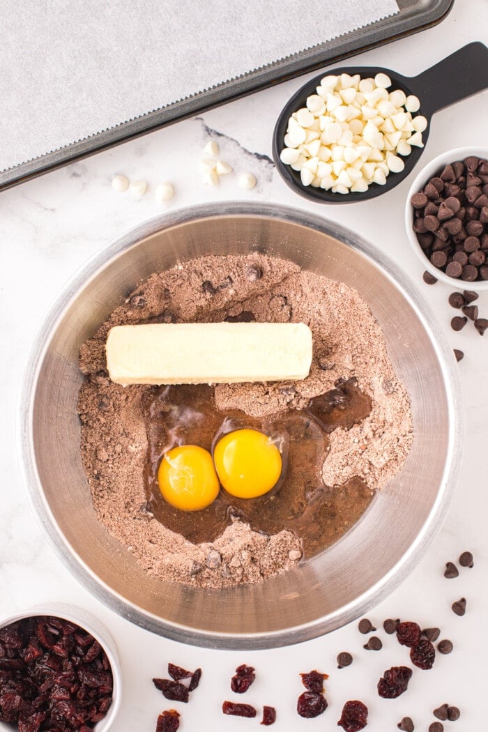 cookie dough mix with butter and eggs in bowl