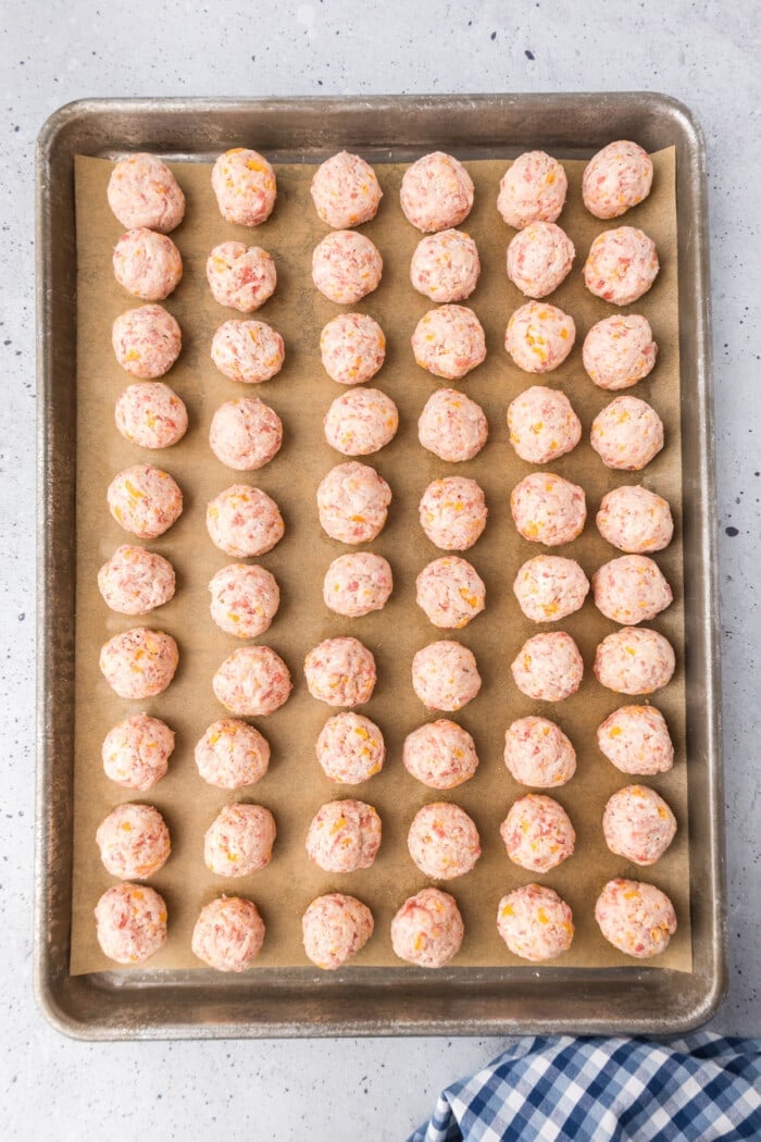 cheddar bay sausage balls on sheet pan