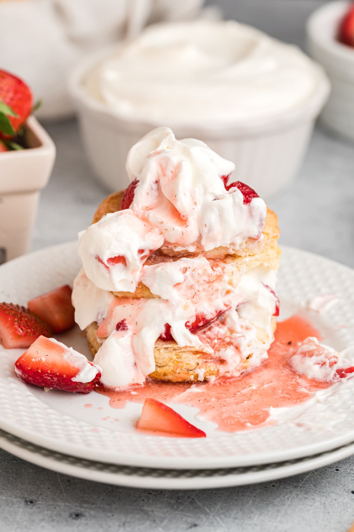 Easy strawberry shortcake that's had a few bites taken out of it