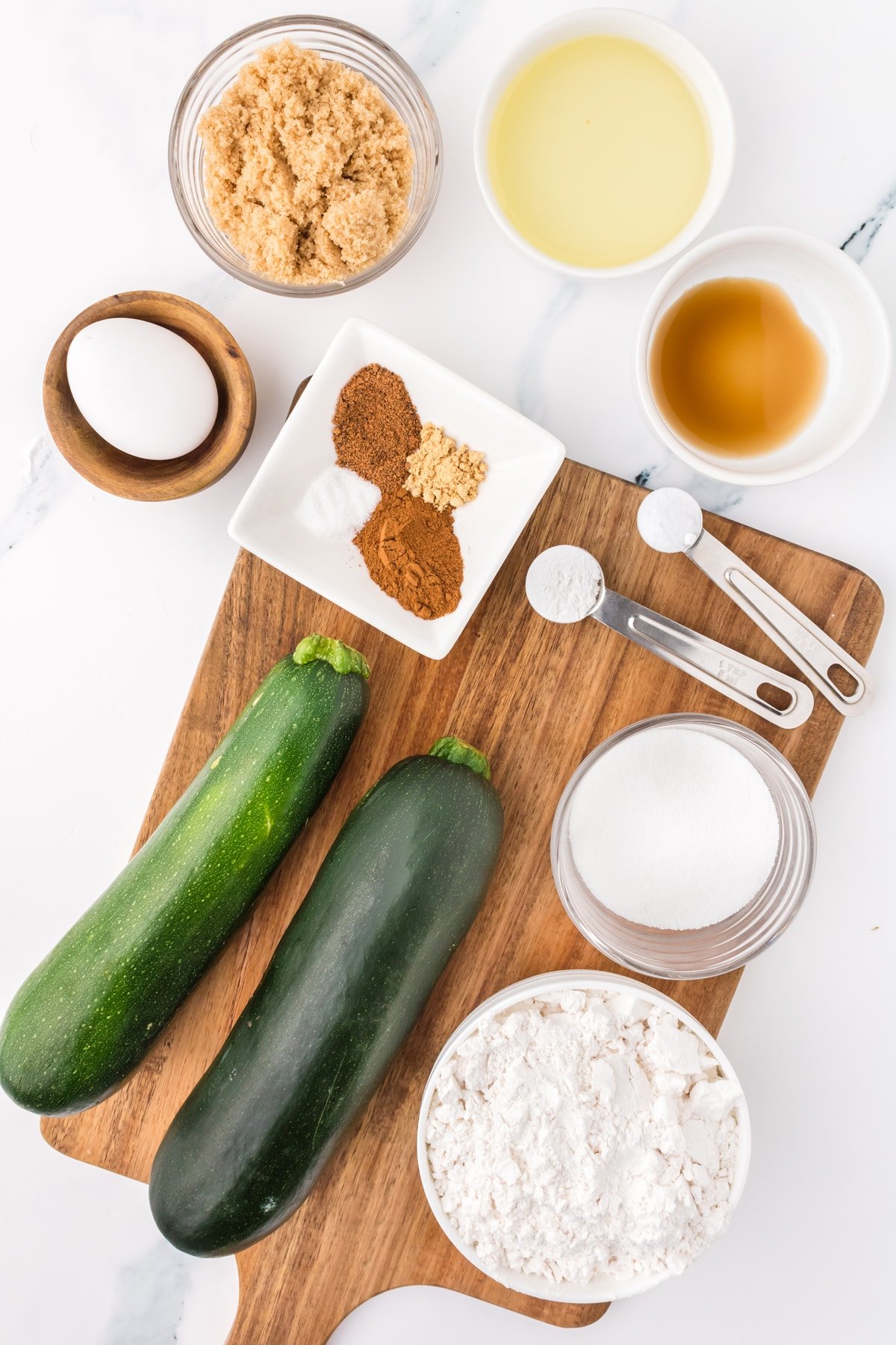 Overhead view of zucchini muffin ingredients