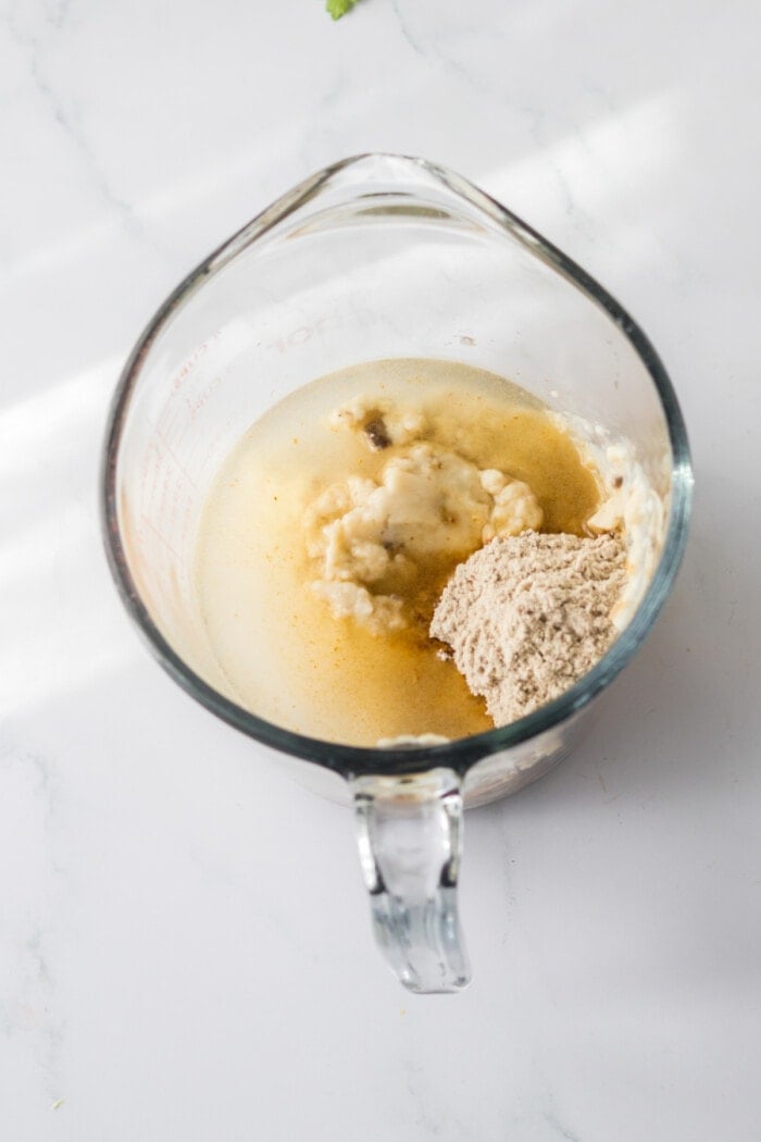 mushroom soup and brown gravy mix in mixing bowl