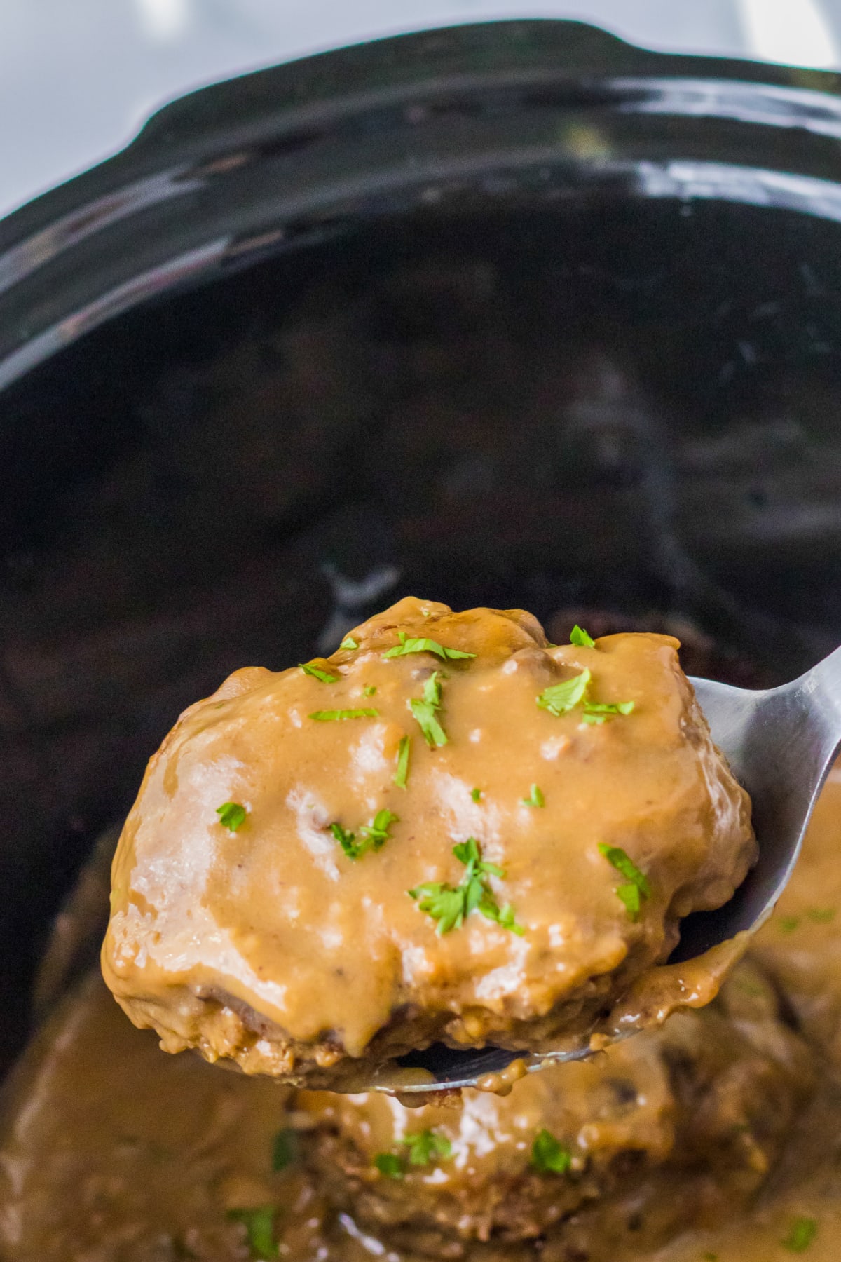 salisbury steak served on spoon