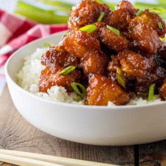 A bowl of firecracker chicken with rice