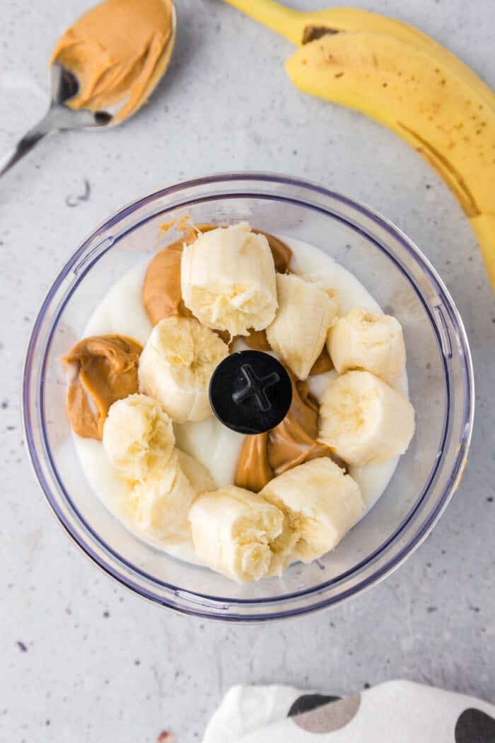 Bananas, peanut butter, and yogurt in a food processor
