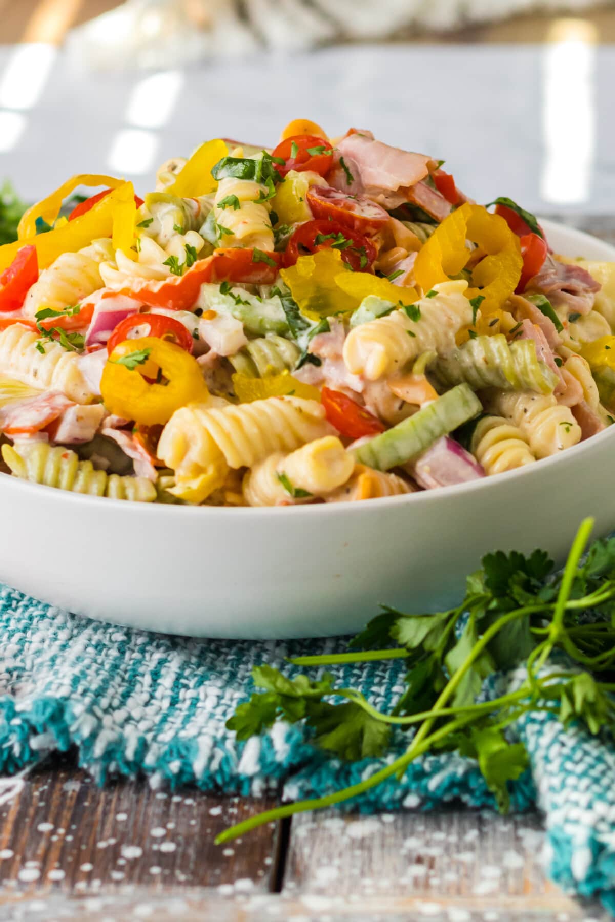 Italian sub pasta salad in a white bowl, side view
