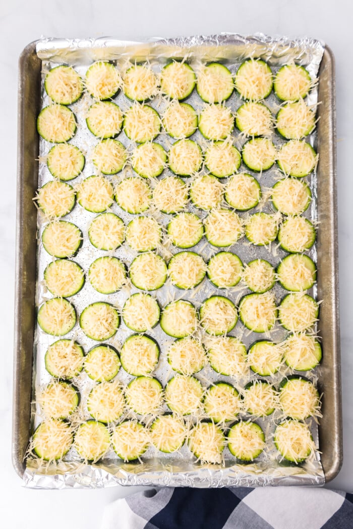 parmesan zucchini on baking sheet ready for oven