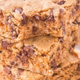 stack of peanut butter oatmeal bars with bite out