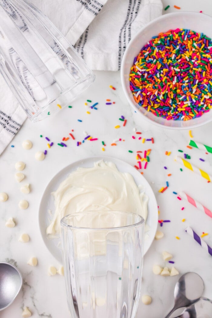 melted white chocolate on plate for rimming vanilla milkshake