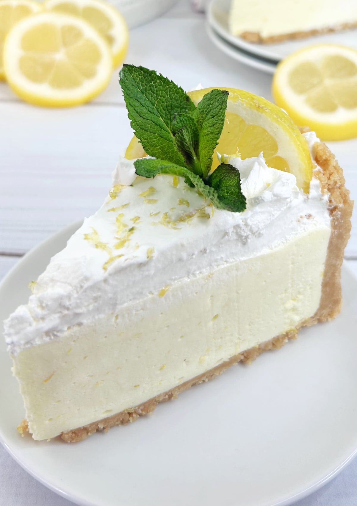 No Bake Lemon Cheesecake slice on a plate top view