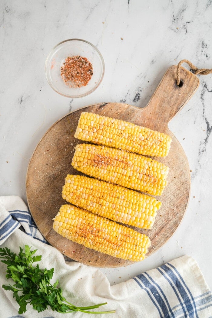 spices added to corn on the cob