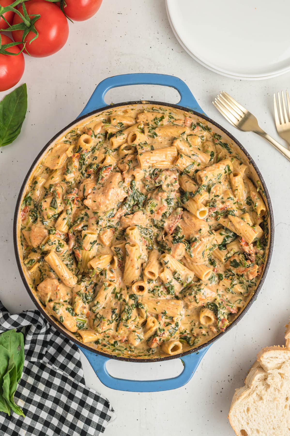 Overhead view of a skillet of Tuscan chicken pasta