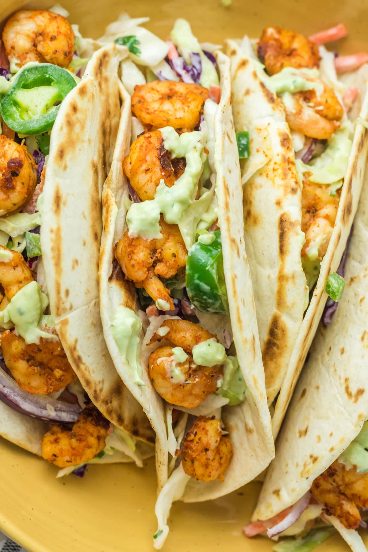 spicy shrimp tacos served with jalapeno coleslaw